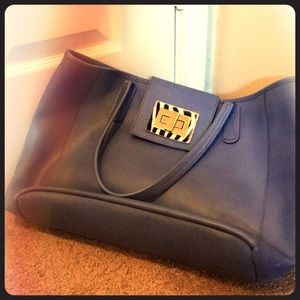 Purple shoulder bag with silver zebra closure